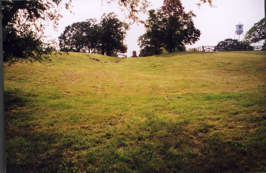 Photograph of trail ruts and monument
